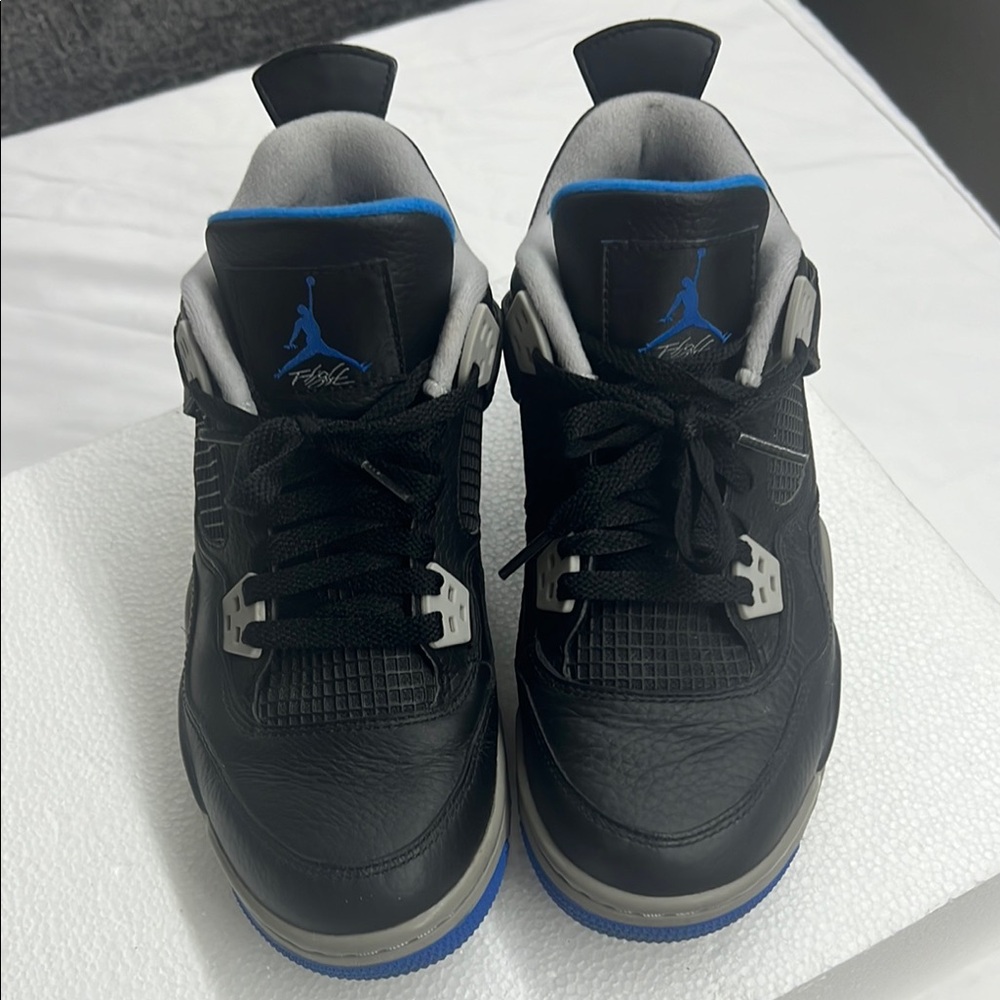 Jordan Black and Blue Air 4 Sneakers with Mesh Panels